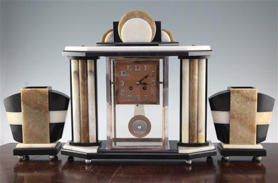 A French Art Deco coloured marble clock garniture, 8in.